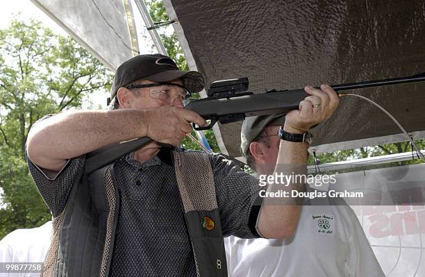 Duncan Hunter shows the form that got him one of the top five scores in the "Crosman Cowboy Action Challenge" during the 10th Annual Great...