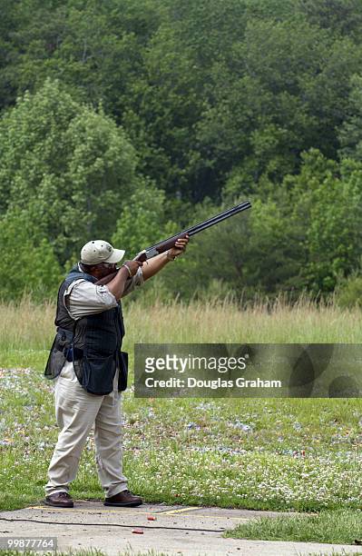 Bennie Thompson bears down on the skeet range during the 10th Annual Great Congressional Shoot-Out at Prince George's Shooting Center in Glenn Dale,...