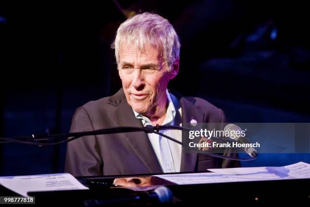 American pianist and composer Burt Bacharach performs live on stage during a concert at the Admiralspalast on July 14, 2018 in Berlin, Germany.