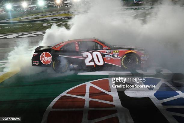Christopher Bell Joe Gibbs Racing Toyota Camry does a burnout on the finish line after winning the NASCAR Xfinity Series Alsco 300 on July 13th at...