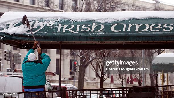 Another snowstorm blanketed Capitol Hill over night with a big storm bearing down on the region over the coming weekend. Here Charles Hines clears...