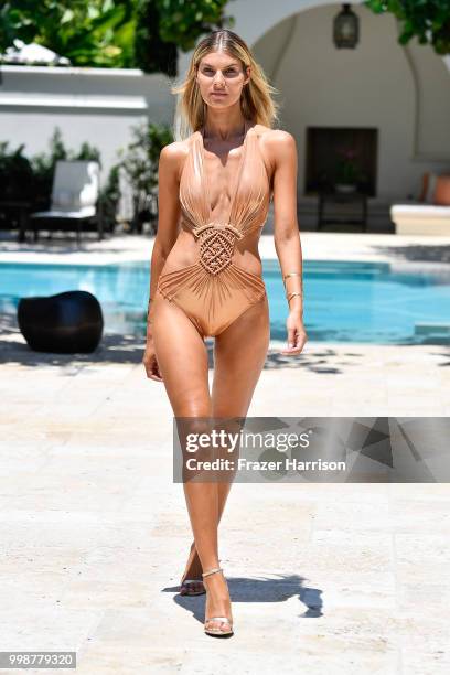 Model walks the runway at Gottex Cruise 2019 Runway Show on July 14, 2018 in Miami Beach, Florida.