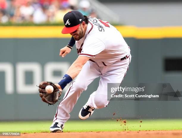 Dansby Swanson of the Atlanta Braves fields a second inning ground ball against the Arizona Diamondbacks at SunTrust Park on July 14, 2018 in...