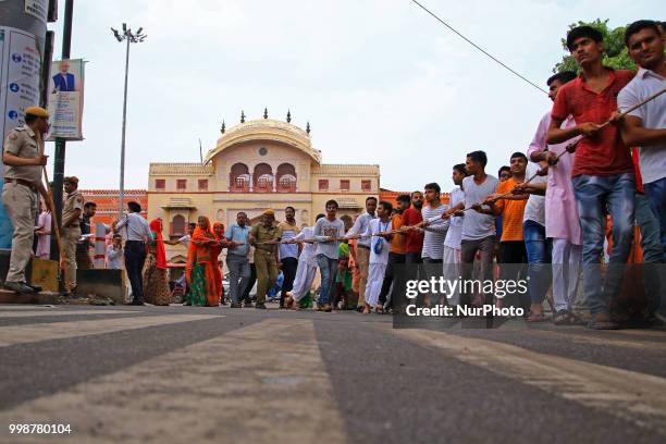 Devotees pull the chariots of Lord Jagannath during the 141st Rath Yatra at Shri Damodar Temple in Jaipur, Rajasthan, India on 14 July,2018.