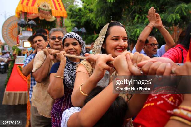 Devotees pull the chariots of Lord Jagannath during the 141st Rath Yatra at Shri Damodar Temple in Jaipur, Rajasthan, India on 14 July,2018.