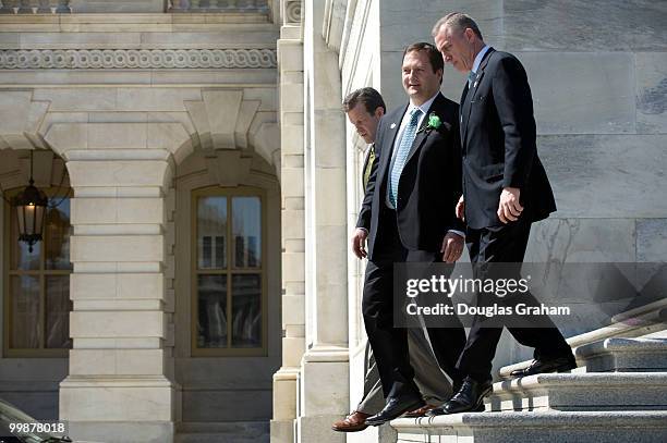 To R; Russ Carnahan, D-MO., Christopher Carney, D-PA and Tim Murphy, R-PA., walk down the East Front steps after the Speaker of the House's annual...