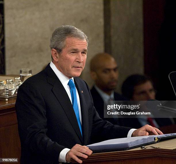 President George W. Bush addresses the U.S. Congress during his State of the Union address at the U.S. Capitol building in Washington on January 28,...