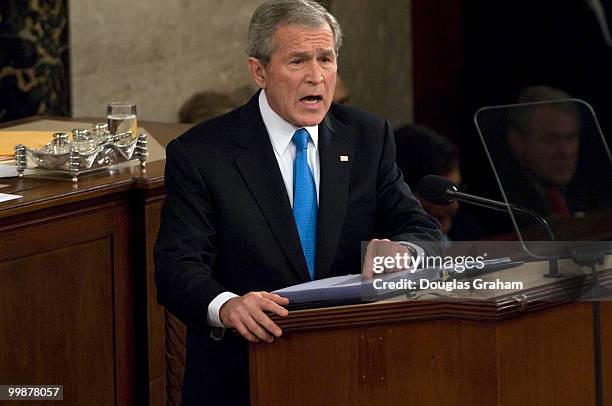 President George W. Bush addresses the U.S. Congress during his State of the Union address at the U.S. Capitol building in Washington on January 28,...