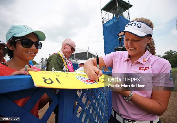 Brooke Henderson of Canada signs autographs after the third round of the Marathon Classic Presented By Owens Corning And O-I at Highland Meadows Golf...