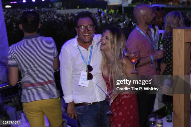 Alan Carr kisses Crissie Rhodes as Barclaycard present British Summer Time Hyde Park at Hyde Park on July 14, 2018 in London, England.