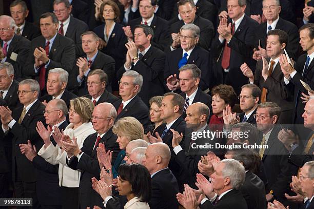 Republican members of Congress listen as President George W. Bush addresses the U.S. Congress during his State of the Union address at the U.S....