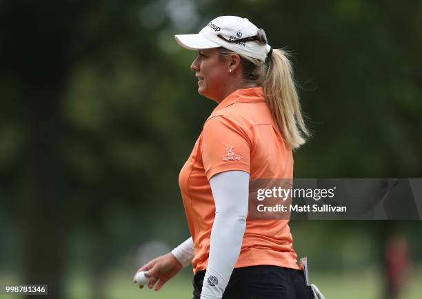 Brittany Lincicome walks off the green on the 18th hole during the third round of the Marathon Classic Presented By Owens Corning And O-I at Highland...