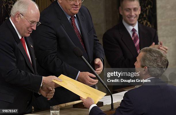 Vice President Dick Cheney and Speaker of the House Dennis Hastert, R-Ill., greet President George W. Bush before the State of the Union address.
