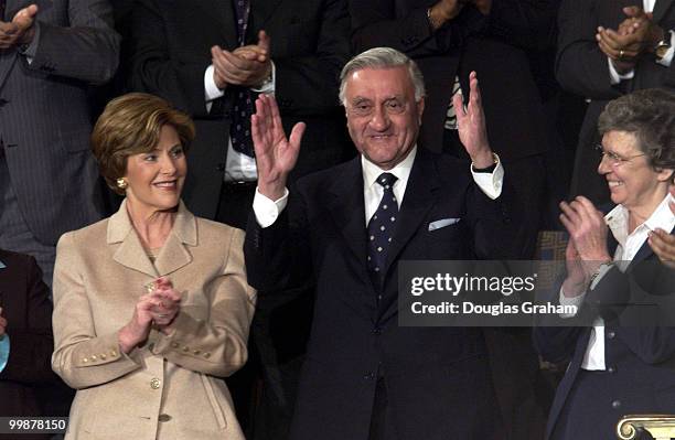 Frist Lady Laura Bush, Iraqi Governing Council chief Adnan Pachachi and Sister Carol Keehan stand as the President introduces them during the State...