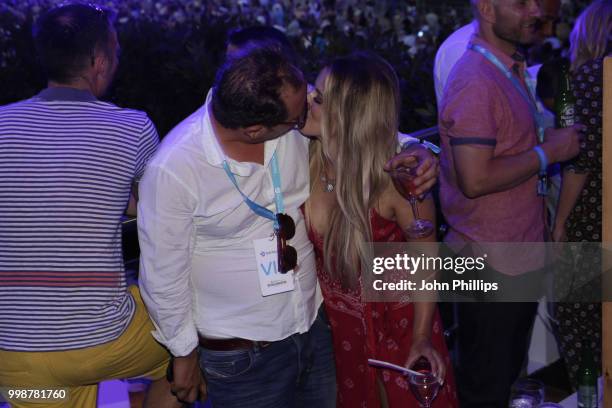 Alan Carr kisses Crissie Rhodes as Barclaycard present British Summer Time Hyde Park at Hyde Park on July 14, 2018 in London, England.