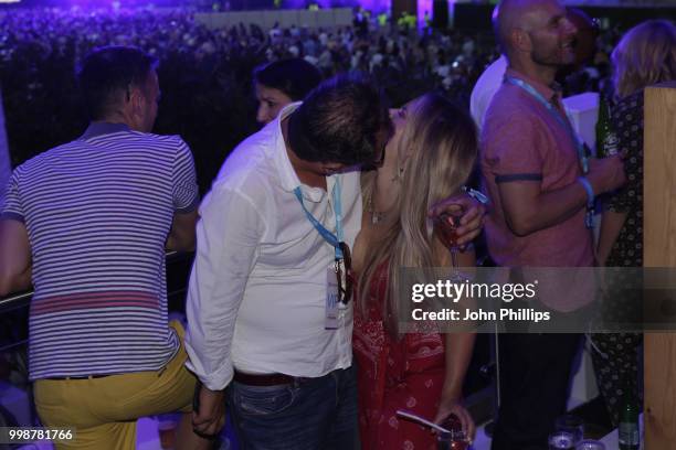 Alan Carr kisses Crissie Rhodes as Barclaycard present British Summer Time Hyde Park at Hyde Park on July 14, 2018 in London, England.