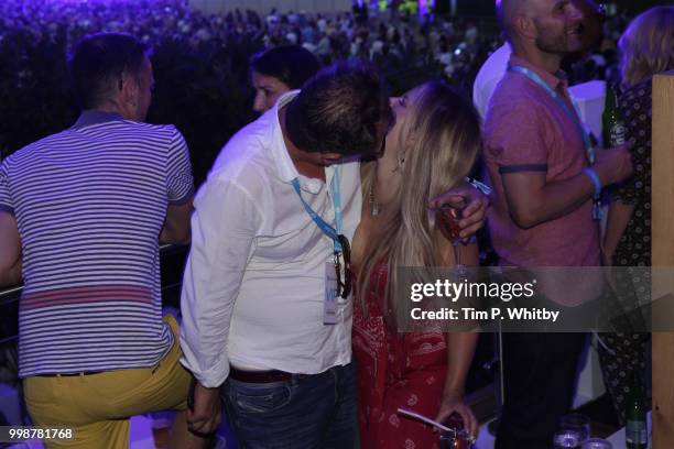 Alan Carr kisses Crissie Rhodes as Barclaycard present British Summer Time Hyde Park at Hyde Park on July 14, 2018 in London, England.