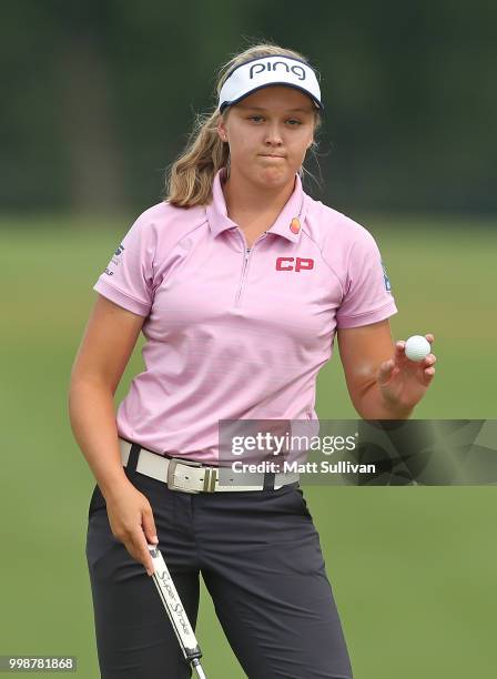 Brooke Henderson of Canada waves to the gallery on the 18th hole during the third round of the Marathon Classic Presented By Owens Corning And O-I at...