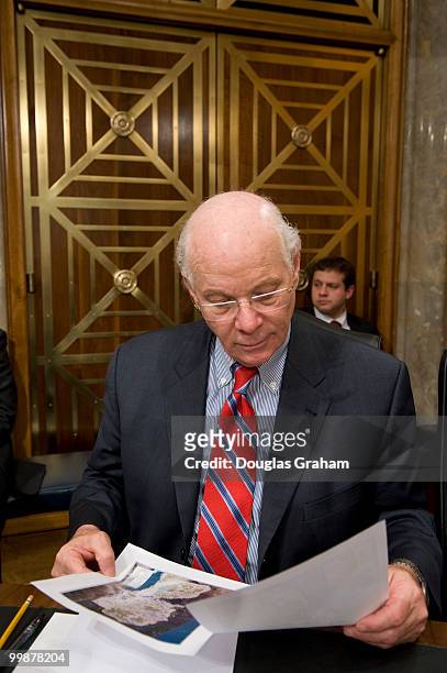 Ben Cardin, D-Md., goes over paper work before the start of the Senate Foreign Relations Committee Middle East Peace full committee hearing on "The...
