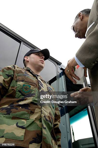 Lt. Governor of the State of Maryland, Michael S. Steele talks with PFC. Smith of the U.S. Air Force before boarding a bus to take a tour of Andrews...