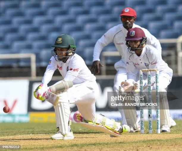 Mushfiqur Rahim of Bangladesh hits 4 during day 3 of the 2nd Test between West Indies and Bangladesh at Sabina Park, Kingston, Jamaica, on July 14,...