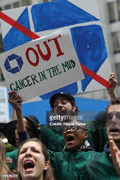 Protesters demonstrate outside JPMorgan Chase's annual shareholder meeting in downtown Manhattan May 18, 2010 in New York City. The protesters...