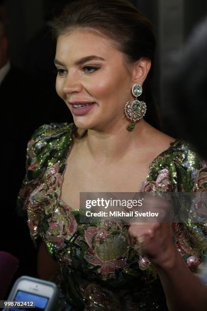 Former gymnast, politician and media manager Alina Kabaeva talks to journalists prior to the concert at Bolshoi Theatre in Moscow, Russia, July 2018....