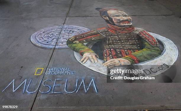 Terra Cotta Warrior guardian of China's First Emperor mural at Union Station is to advertise, an exhibition at the National Geographic Museum in...
