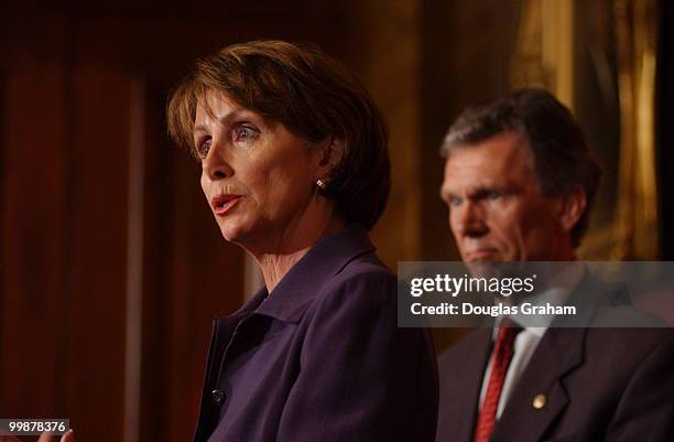 Democratic Leader Tom Daschle, D-SD., and House Democrati Leader Nancy Pelosi, D-CA., during a press conference on President Bush's dividend tax...