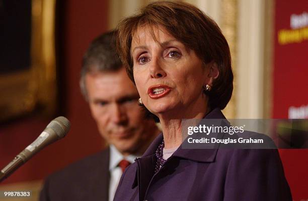 Democratic Leader Tom Daschle, D-SD., and House Democrati Leader Nancy Pelosi, D-CA., during a press conference on President Bush's dividend tax...