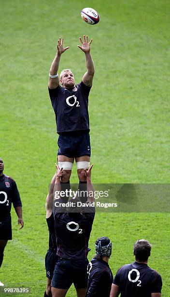 James Haskell passes the ball during an England training session held at Twickenham on May 18, 2010 in Twickenham, England.