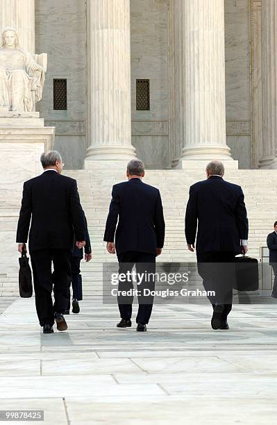 Floyd Abrams, Mitch McConnnell, R-KY., and Jan Baran walk to the Supreme Court for the start of the hearing on the campaign finance law suit.