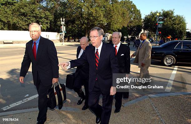 Senator Mitch McConnell, R-KY and his legal team, Ken Star, Jan Baran and Floyd Abrams make their way to the U.S. Supreme Court for oral arguments in...