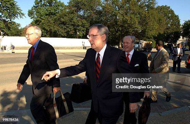 Senator Mitch McConnell, R-KY and his legal team, Ken Star, Jan Baran and Floyd Abrams make their way to the U.S. Supreme Court for oral arguments in...