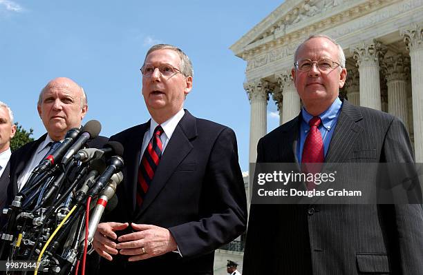 Senator Mitch McConnell, R-KY and his legal team, Ken Star and Floyd Abrams talk with the press at the U.S. Supreme Court where oral arguments are...