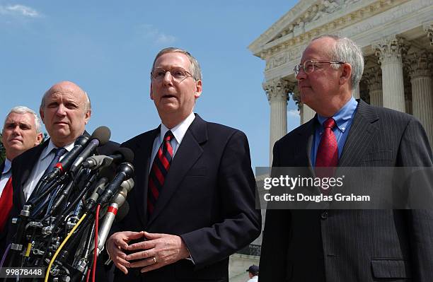 Senator Mitch McConnell, R-KY and his legal team, Ken Star and Floyd Abrams talk with the press at the U.S. Supreme Court where oral arguments are...