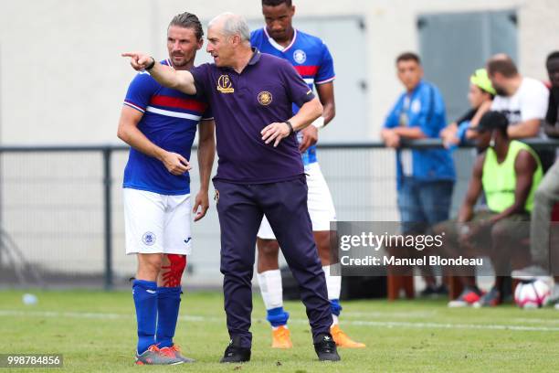 Head coach Alain Casanova and Yannick Cahuzac of Toulouse during a friendly match between Toulouse and Ajaccio on July 14, 2018 in Toulouse, France.