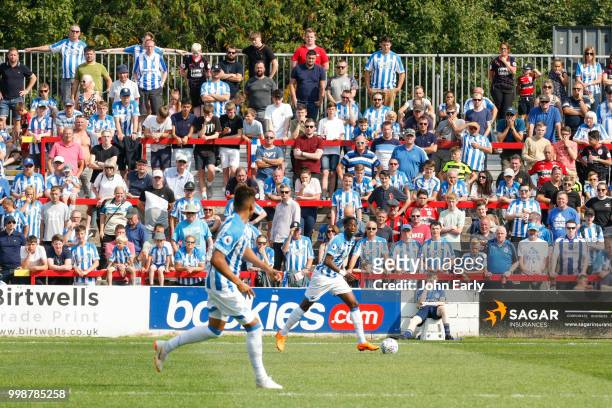 Terence Kongolo of Huddersfield Town in front of the away fans during the pre-season friendly between Accrington Stanley and Huddersfield Town at The...