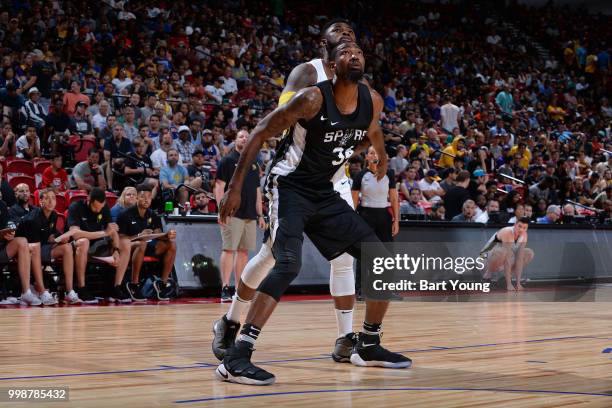 Cory Jefferson of the San Antonio Spurs boxes out against Travis Leslie of the Indiana Pacers during the 2018 Las Vegas Summer League on July 7, 2018...