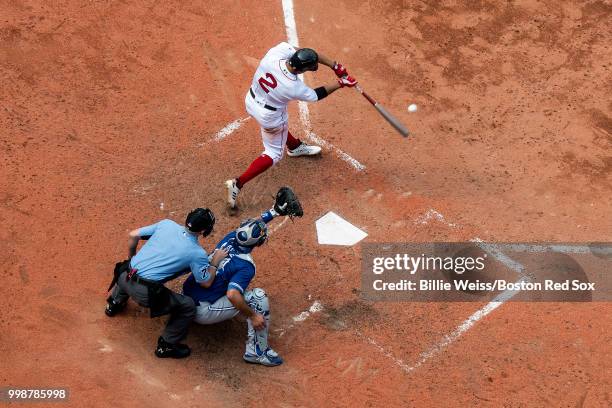 Xander Bogaerts of the Boston Red Sox hits a walk-off grand slam home run during the tenth inning of a game against the Toronto Blue Jays on July 14,...