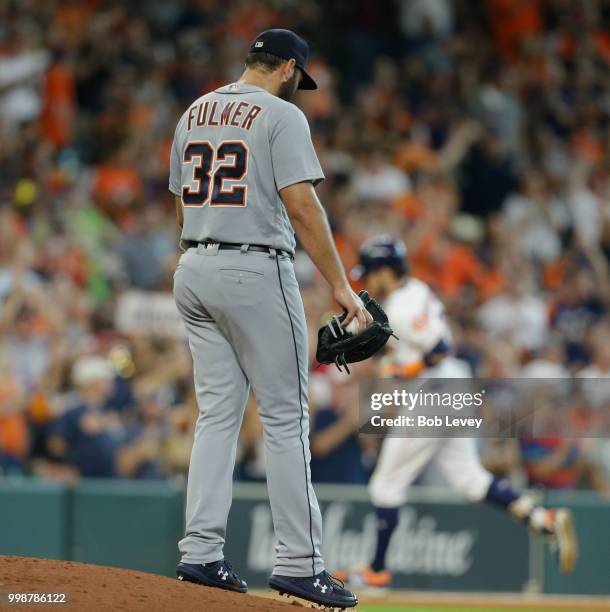 Michael Fulmer of the Detroit Tigers gives up a home run to Josh Reddick of the Houston Astros in the fifth inning at Minute Maid Park on July 14,...