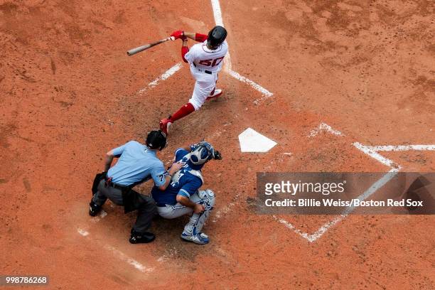 Mookie Betts of the Boston Red Sox bats during the fourth inning of a game against the Toronto Blue Jays on July 14, 2018 at Fenway Park in Boston,...