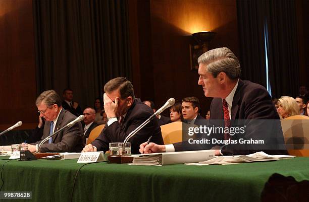 Attorney General John Ashcroft; Homeland Security Secretary Tom Ridge and Robert Mueller, director, FBI during the Senate Judiciary Committee,...