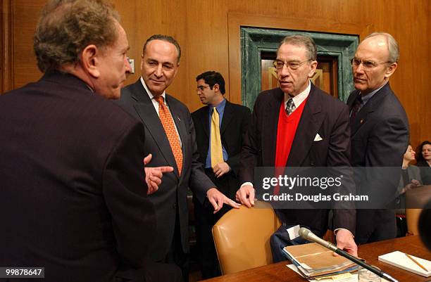 Arlen Spector, R-PA., Charles Schumer, D-N.Y., Charles Grassley, R-IA., and Larry Craig, R-ID., talk befor eht estart of the during the Senate...
