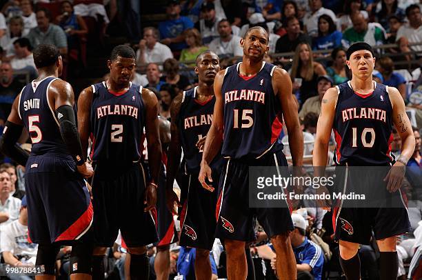 Josh Smith, Joe Johnson, Jamal Crawford, Al Horford and Mike Bibby of the Atlanta Hawks stand on the court in Game One of the Eastern Conference...