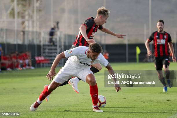 David Brooks of Bournemouth competes for the ball with Daniel Carriço of Sevilla during AFC Bournemouth v Sevilla, pre-season friendly, at La Manga...