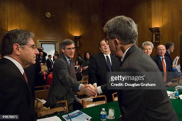 Tom Coburn, R-OK., greets the witnesses testifying before the full committee hearing on "The Need for FDA Regulation of Tobacco Products." Witnesses:...