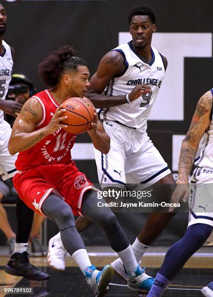 Marvelle Harris of Team Challenge ALS guards Buddha Boyd of the Fort Hood Wounded Warriors during the game at Eagle's Nest Arena on July 14, 2018 in...