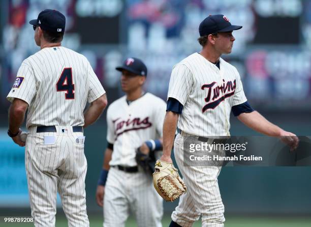 Zach Duke of the Minnesota Twins is pulled from the game against the Tampa Bay Rays by manager Paul Molitor during the seventh inning of the game on...