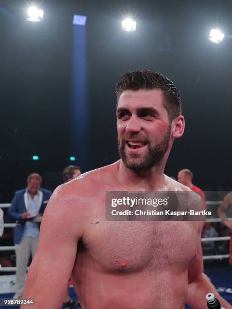 Rocky Fielding of Great Britain celebrates after winning the WBA Super Middelweight World Championship title between Tyron Zeuge and Rocky Fielding...